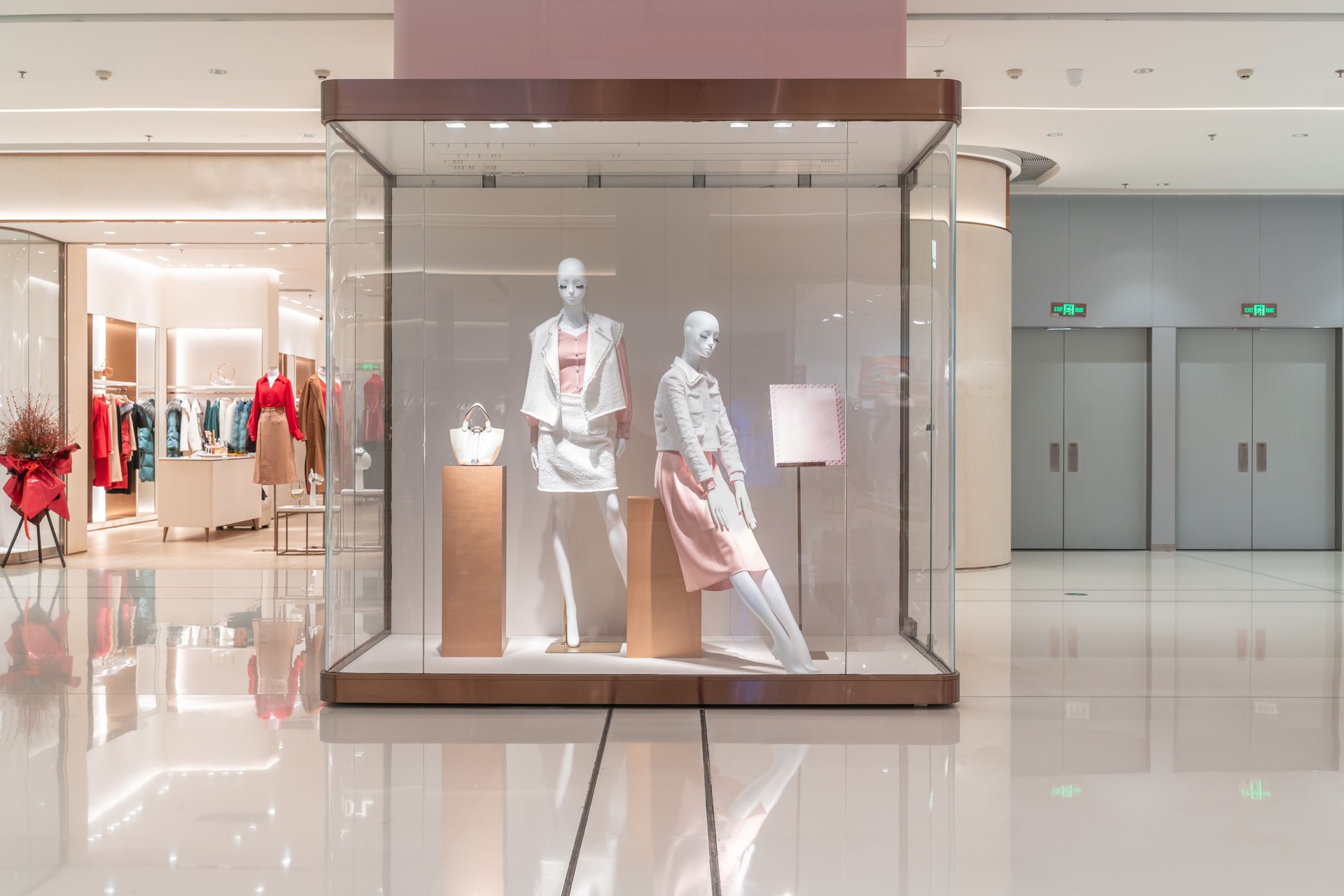 luxury fashion store front in modern shopping mall.